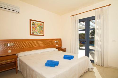Foto de una habitación de Sun Grove Villas &amp;amp; Spa