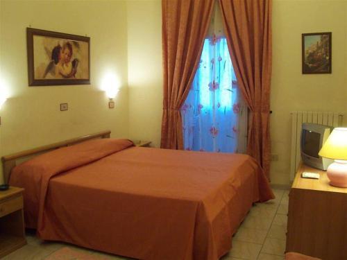 Foto de una habitación de Hotel Pensione Romeo
