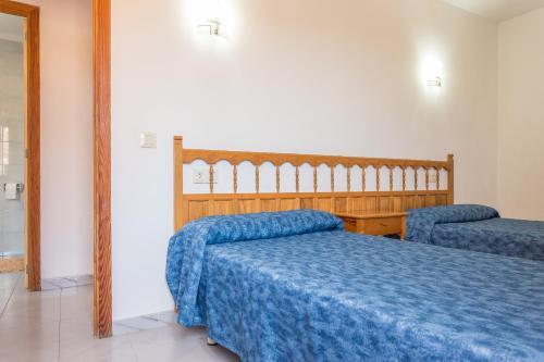 Foto de una habitación de Apartamentos Viviendas Margarita II