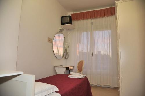 Foto de una habitación de Hotel Baia Marina