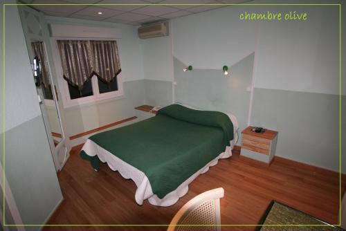 Foto de una habitación de Hôtel de La Paix