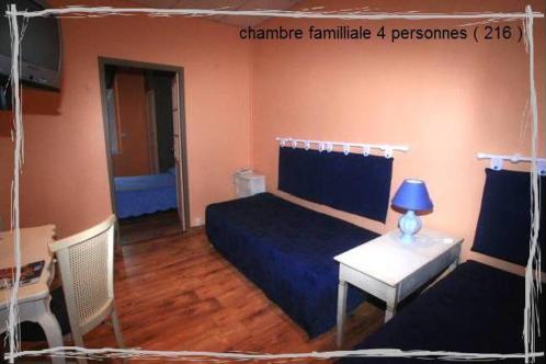 Foto de una habitación de Hôtel de La Paix