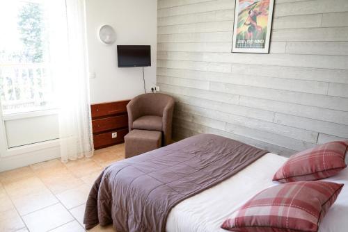 Foto de una habitación de Apartamentos Residence Les Cimes