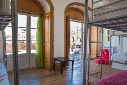 Foto de una habitación de This Is Lisbon Hostel