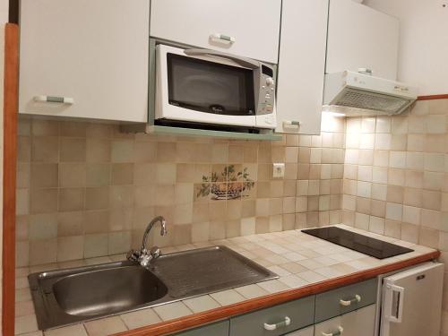 Foto de una habitación de Apartamentos Grifovacances Tres Estrelles Club