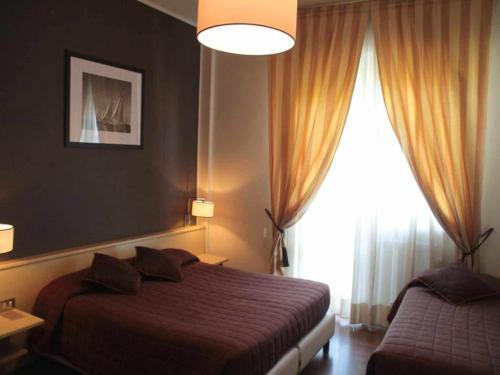Foto de una habitación de Hotel Ancora Riviera