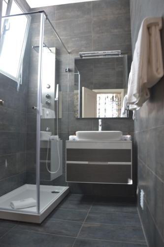 Foto del baño de Villa Rio Guest House Suites