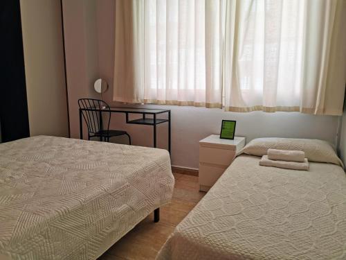 Foto de una habitación de Barcelona City North Hostal