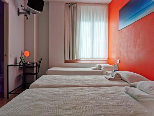 Foto de una habitación de Barcelona City North Hostal