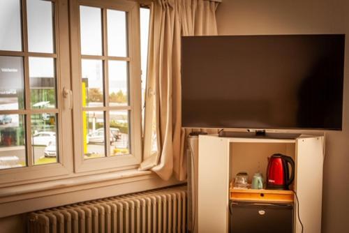 Foto de una habitación de Hotel La Chaumiere