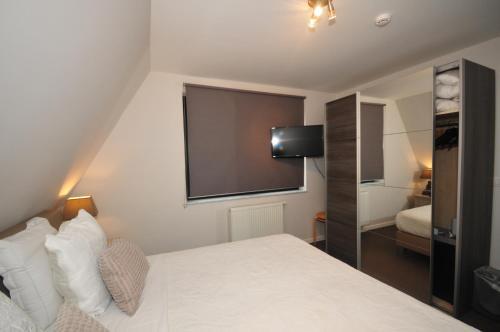 Foto de una habitación de Hotel La Chaumiere