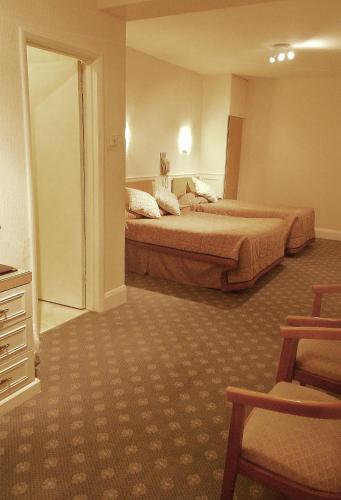 Foto de una habitación de Burley Court Hotel