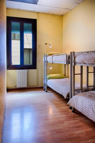 Foto de una habitación de Itaca Hostel