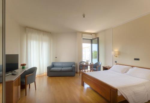 Foto de una habitación de Hotel Il Timone