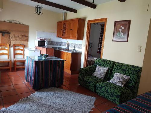 Foto de una habitación de Apartamentos Turísticos Rural Los Tinaos
