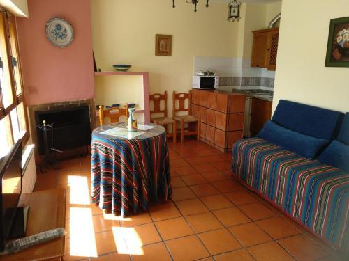 Foto de una habitación de Apartamentos Turísticos Rural Los Tinaos