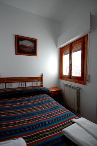 Foto de una habitación de Apartamentos Turísticos Rural Los Tinaos