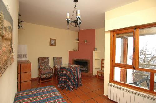 Foto de una habitación de Apartamentos Turísticos Rural Los Tinaos