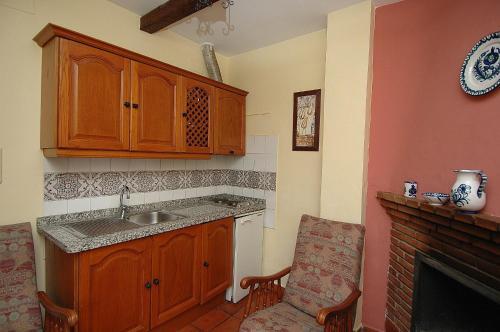 Foto de una habitación de Apartamentos Turísticos Rural Los Tinaos