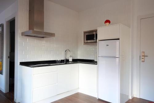 Foto de una habitación de Fuente Torán Apartamentos