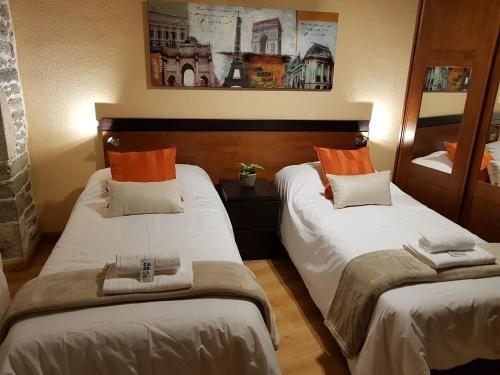 Foto de una habitación de Aqua Rooms Sarria