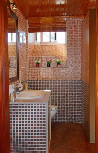 Foto del baño de Aqua Rooms Sarria
