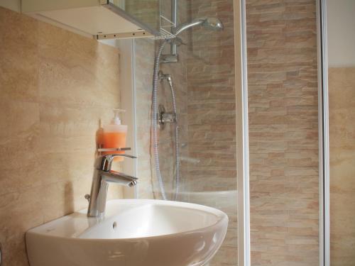 Foto del baño de Rooma Beb
