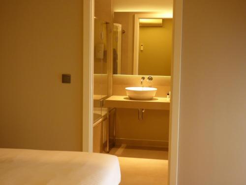 Foto del baño de Avenida Boutique Hotel