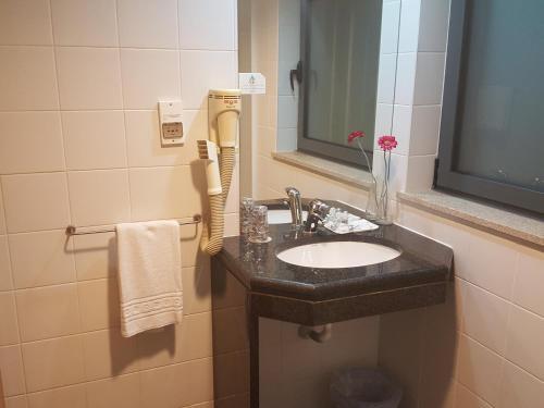 Foto del baño de Hotel Jose Alberto