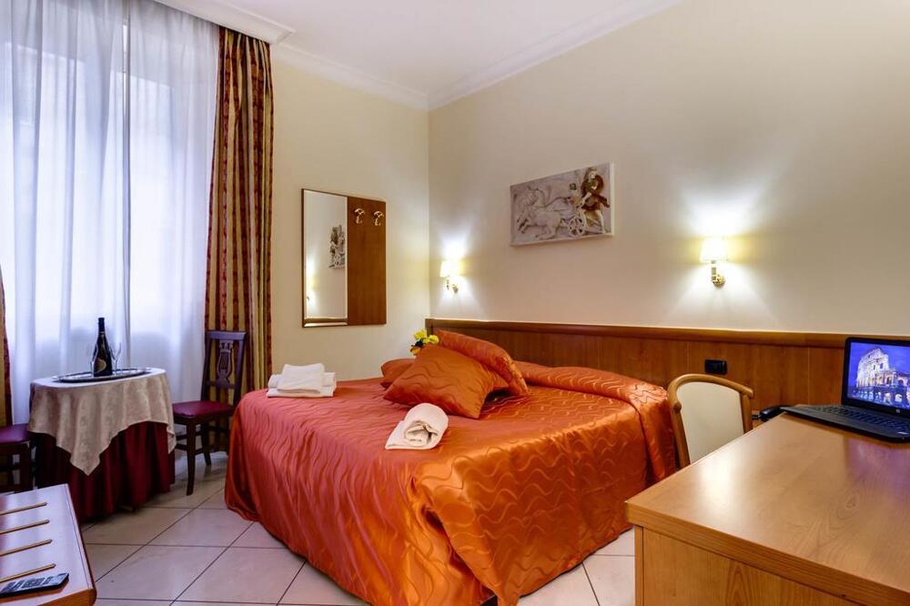 Foto de una habitación de Hotel Suite Caesar