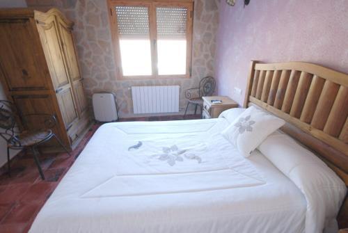 Foto de una habitación de Hotel Hospedería Río Zumeta Spa