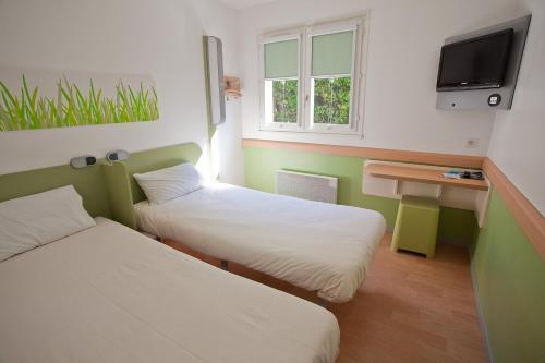 Foto de una habitación de Hotel ibis budget Marne la Vallée