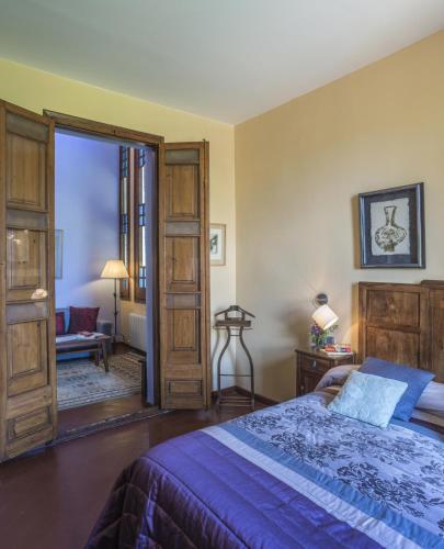 Foto de una habitación de Hotel Monumento Can Garay