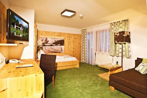 Foto de una habitación de Landhotel Alpenhof Filzmoos