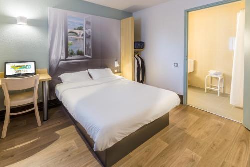 Foto de una habitación de B&amp;amp;B Hôtel NANTES Parc Expos La Beaujoire
