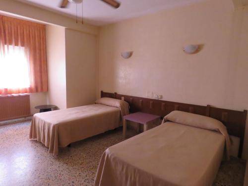 Foto de una habitación de Hotel Alain