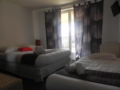 Foto de una habitación de Hôtel Aiglon Bylitis