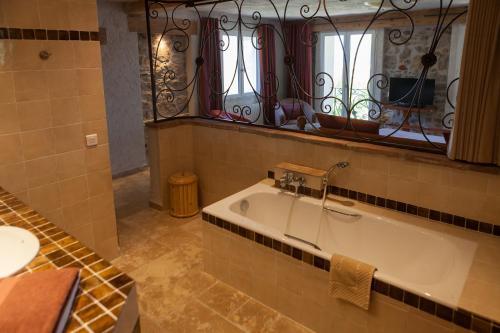 Foto del baño de L&amp;#039; Escapade Hôtel &amp;amp; Restaurant