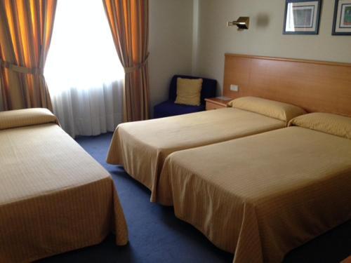 Foto de una habitación de Hotel Ramos