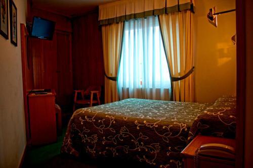 Foto de una habitación de Hotel Ramos
