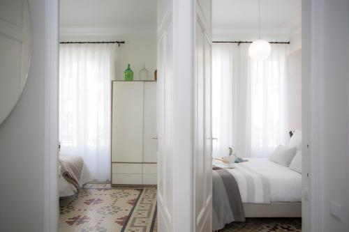 Foto de una habitación de Apartamentos SingularStays Parque Central
