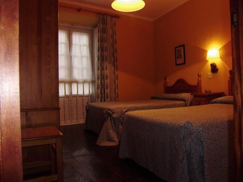Foto de una habitación de Escuder Apartamentos Turísticos