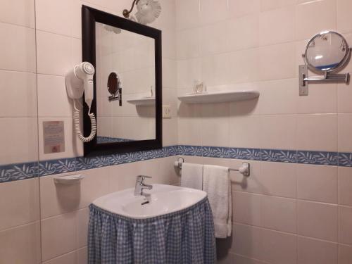Foto del baño de Escuder Apartamentos Turísticos