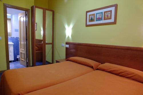 Foto de una habitación de Hostal Los Claveles