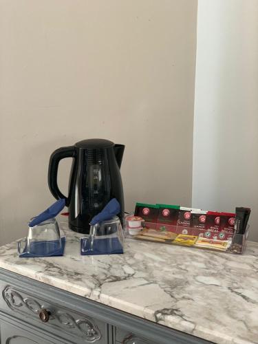 Foto de una habitación de Hotel Reina Rooms