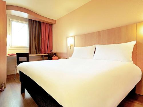 Foto de una habitación de Hotel ibis Beauvais Aeroport
