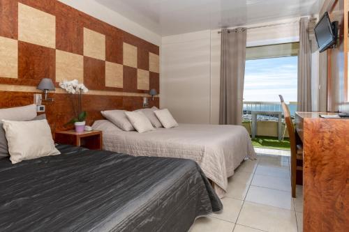 Foto de una habitación de Hotel Le Richmont