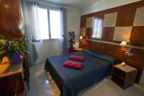 Foto de una habitación de Hotel Le Richmont
