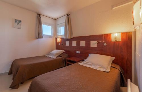 Foto de una habitación de Hotel Les Dunes