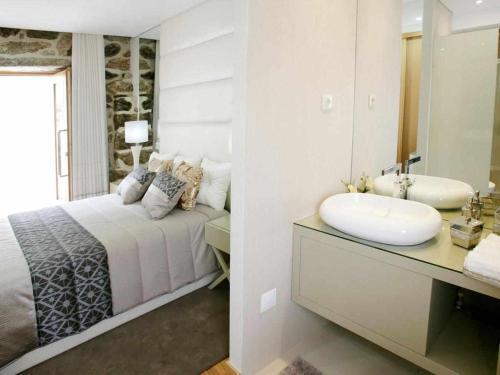 Foto del baño de Casa das Pesqueiras